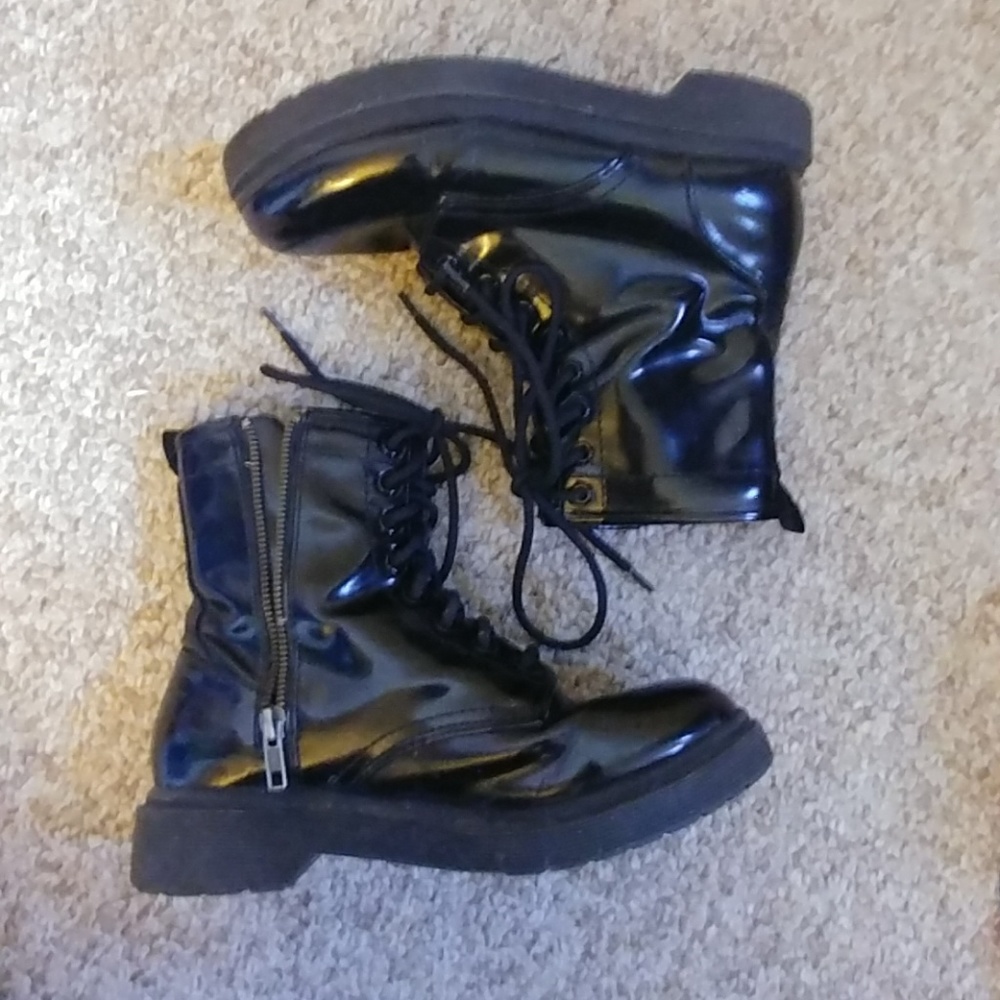 Shiny black combat boots